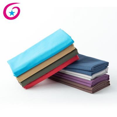 China Tear-Resistant For Shopping Bag Plain 6oz Dye Canvas Material 100% Cotton Fabric for sale