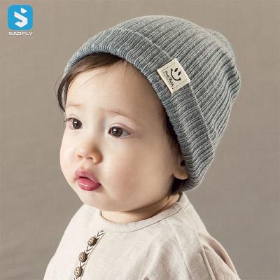 China JOINT Fashion Fitted Embroidery Knitting Cotton Single Color Knit Cap Kids Newborn Baby Beanie Hat for sale