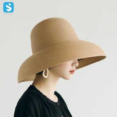 China Custom Character New Fashion Summer Women Beach Sun Hat Wide Brim Panama Hat Parasol Straw Hats for sale