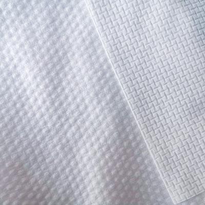 China Breathable Cotton Fabric Factory Direct Supply Wet Wipe Material Embossed Nonwoven Roll for sale