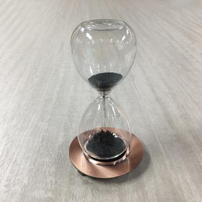 China OEM Price Glass Bottle Magnet Sand Timer Table Sand Timer Contemporary Customized Anti Gravity Time Hourglass for sale