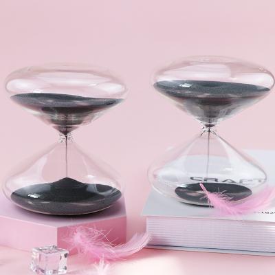 China Hot Selling Glass Sand Clock 1-25MIN Hourglass Sand Clock Disc Shape Table Clock Craft Contemporary Chinese New Products Suppliers for sale