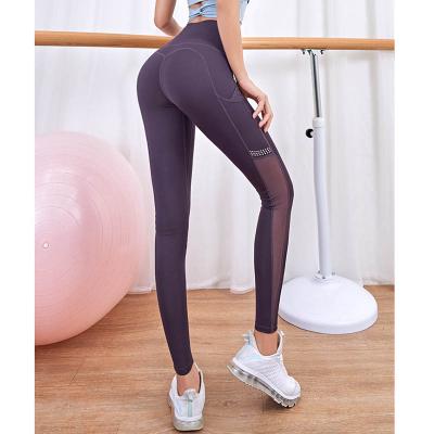 China Running yoga leggings sets of new breathable sportswear for women with bare sense of gym clothes make women look thinner for sale