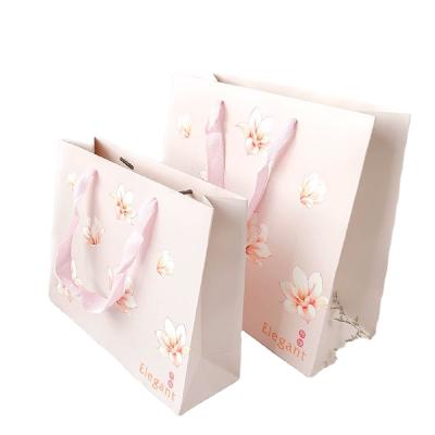 China China Suppliers Shock Resistance Wholesales Custom Pink Flowers Printed Shopping Paper Bag With Handle for sale