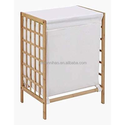 China Amazon Bamboo Laundry Hamper Mid Century Modern Warm Wood Laundry Hamper With Liner Bag Storage Basket Shelves Space Saving Laundry Shelves for sale