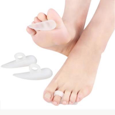 China Provide support and relieve pain caused by transparent soft clawed or hammer toe tips gel toe protector for claw or hammer toes silicon foot care toe pad for sale