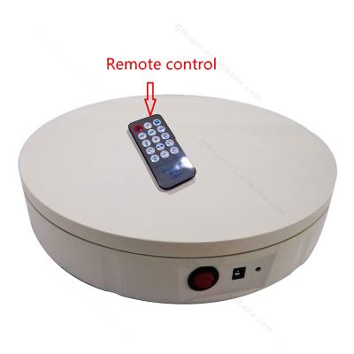 China 2021 hot sale 30CM shopping mall remote control infrared sensor 360 electric rotating 100KG turntable carrying weights for sale