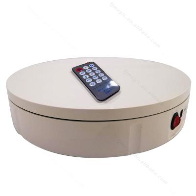 China Shopping mall 30CM remote control infrared sensor 360 electric rotating turntable 100KG carrying weights for sale