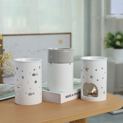 China Beautiful Cheap Wholesale AROMATIC Shape Ceramic Tart Hotter Star Oil Burners Oil Fragrance Candle Holder for sale