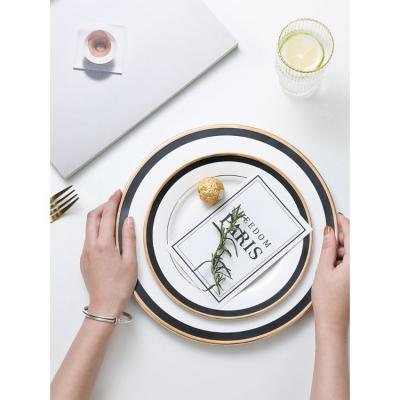 China Sustainable Ceramic Western Restaurant Minimalist Round White Gold Edge Steak Kitchen Pasta Plate Dish for sale