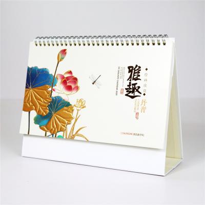 China Chinese New Year 2021 Elegant Painting Desk Calendar with Metallic Paper for sale