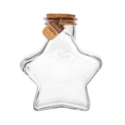 China Beautiful Transparent Five-pointed Star Shape Glass Jar Glass Drifting Wishing Bottle With Cork for sale