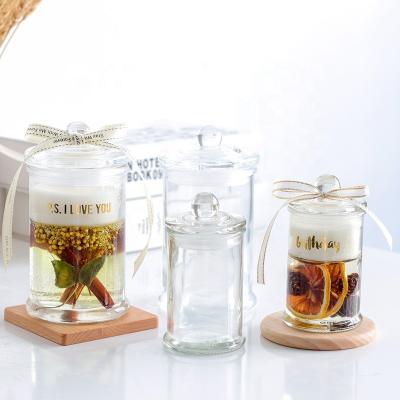 China Custom Home Decor Decorative Gift Clear Glass Jar With Glass Lid For Scented Candle for sale