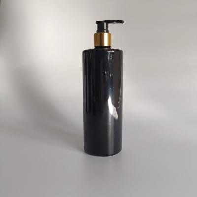 China Household Products 500ml PET Plastic Black Color Cosmetic Bottle With Gold And Silver Lotion Pump Sprayer for sale