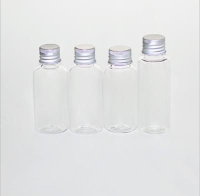 China 40ml Household Products PET Clear Round Shape Plastic Color Lotion Shampoo Bottle With Aluminum Screw Cap for sale