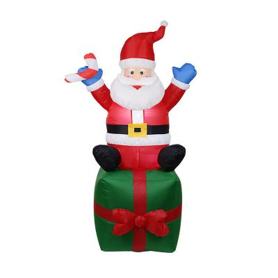 China Outdoor Holiday Decoration Blow Up Christmas Santa With Inflatable Santa Gift Box Christmas Decorations Yard For Wholesale for sale