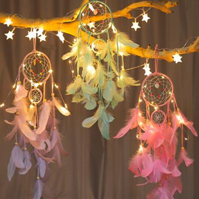 China Africa Christmas Pink Feather Catcher Dreamcatcher Trend Pendant Wind Chime for sale