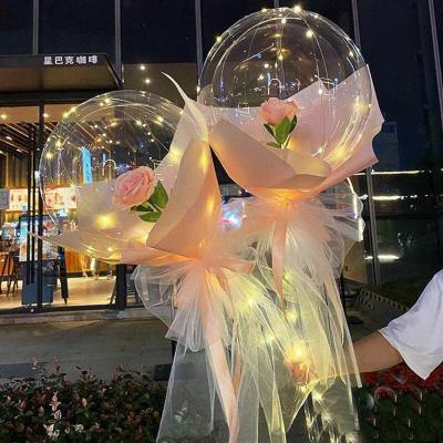 China Advertising Toy Birthday Balloons LED Luminous Balloon Rose Bouquet Light Transparent Balloons with Flower for Wedding Party for sale