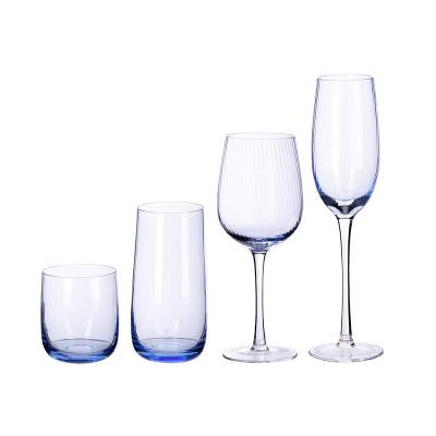 China Minimalist Hand White Red Wine Glasses Clear Big Shape Premium Ombre Blue Champagne Glass Fashion Design Crystal Trendy Wine Glass for sale