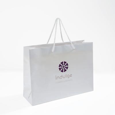 China Recycled Materials Customized Luxury White Crafted Craft Gift Clothing Packaging Shopping Paper Bags for sale