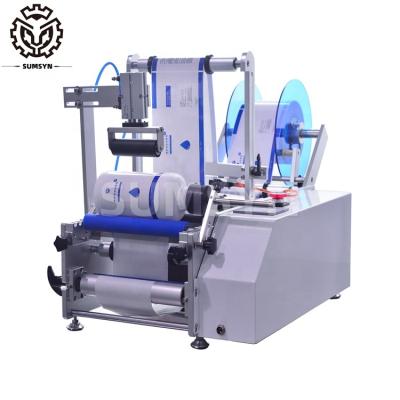 China Semi automatic round bottle labeling machine for small bottle jar cans paint can bucket for sale