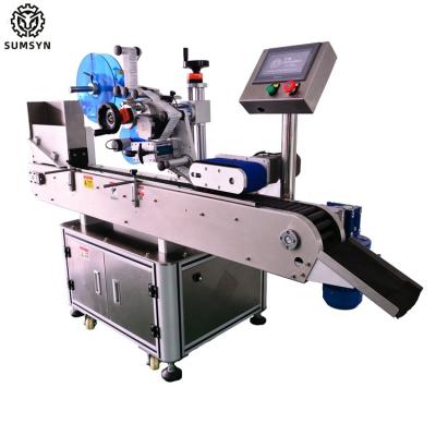 China Automatic small tube labeling machine for vials lipstick ball pen bettery soft tube syringes labeling for sale