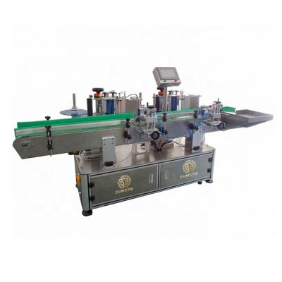 中国 Automatic double head round bottle labeling machine Automatic position labeling machine 販売のため