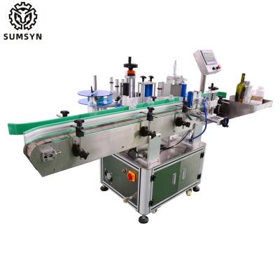 中国 Automatic round bottle labeling machine bottle label applicator for jars cans wine beer glass plastic bottle labeling 販売のため