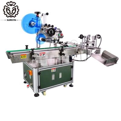 China Automatic box corner labeling machine label applicator transparent tape corner sticker sealing labeling for sale