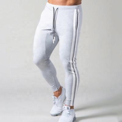 China Breathable Mens Tight Pants Jogging Trousers Sports Fitness Casual Zipper Pants For Male for sale