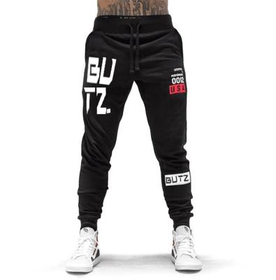 China Men's Sportswear Flat Tracksuit Bottoms Track Pants Gyms Joggers Skinny Men's Fitness Casual Pants Black Track Pants Sweatpants for sale