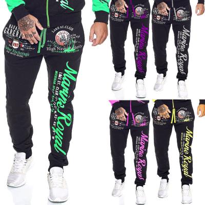 China Casual Flat Men's Pants Letter Printing Color Blocking Lace Up Loose Running Gaiters Fitness Pants for sale