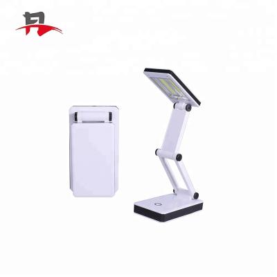 China Modern 4AAA The Brightest 2COB Led Light Dimmable Foldable Mini Rechargeable Desk Table Lamp for sale