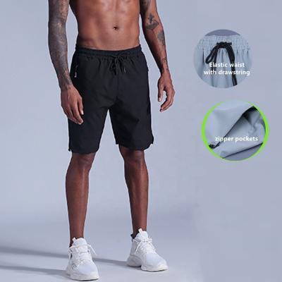 China Anti-Wrinkle 3 Colors Moisture Wicking Straight Quick Dry Men Shorts Half Length Panties With Zipper Pockets Elastic Waist With Drawstring for sale