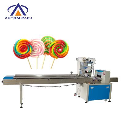 China Factory price chocolate bar food automatic overflowing wrapper machine/cookie/cake packing machine for sale