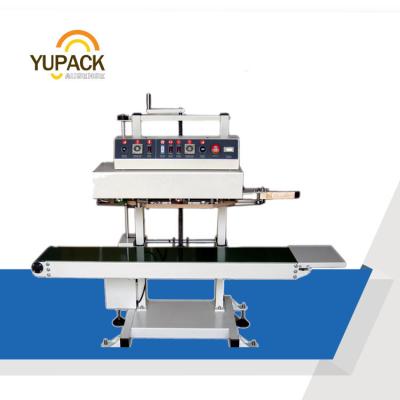 China SPM-200 CLOTHING High Performance Continuous Vertical Tape Sealer for sale