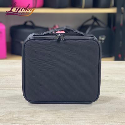 China Black Portable Large Capacity Travel Makeup Bag Large Capacity Makeup Bag Customized Makeup Bag for sale