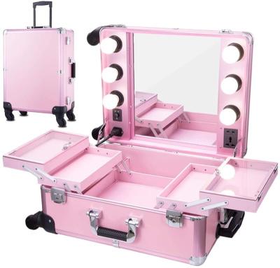 China Large Capacity Studio Artist Pink Professional Rolling Makeup Train Case with Lightweight Wheeled Organizer, Large Portable Vanity Case with Mirror for sale