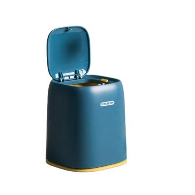 China Viable Mini Countertop Swing Lid Trash Can Place Desktop Plastic Swing Trash Can for sale