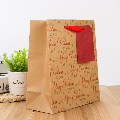 China Feature Recyclable Recyclable Handle Packing Brown Kraft Paper Bags With Ribbon Handle for sale