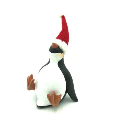 China Sitting Cute Christmas Decor Home Decoration Set Penguin Polyresin Resin Penguin Figurines Ornament with Red Felt Hat and Scarf for sale