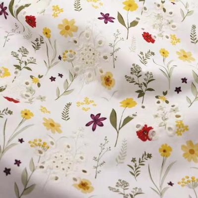 China 2022 Breathable Best Sell Wholesale Eyelet Embroidery On Multicolor Floral Cotton Printed Fabric for sale