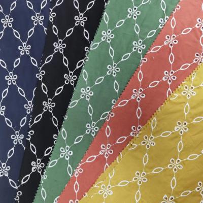 China Breathable High Fashion Eyelet Cotton Fabric 100 Colored Cotton Soft Hand-Feeling Embroidery Fabric for sale