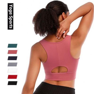 China Breathable Women High Stretch Slim Fit Compression Strappy Fitness Bra With Pads for sale