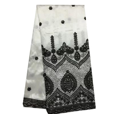 China Viable Black And White African George Lace Fabric Georges Indian Silk Lace Fabric for sale