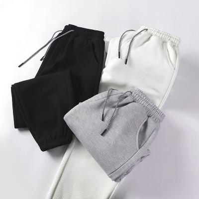 China Spring and Autumn New Sports Pants Loose Casual Men's Anti-wrinkle Wide Leg Style Trend All-match Sweatpants new for sale