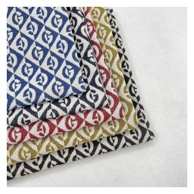 China Keer anti-static stock logo polyester cotton sofa bag fabric designer fabric high quality custom upholstery jacquard brocade fabric for sale