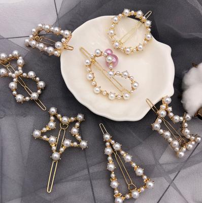 China Wedding /holiday party decoration Tik-tok trend headdress, pearl hair clip, female INS bow, bow tie clip hair accessories, wholesale hair accessories for sale