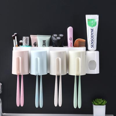 China Viable Multifunctional Self Adhesive Toothbrush Holder, Automatic Toothpaste Dispenser Space Saving Toothbrush Organizer for sale