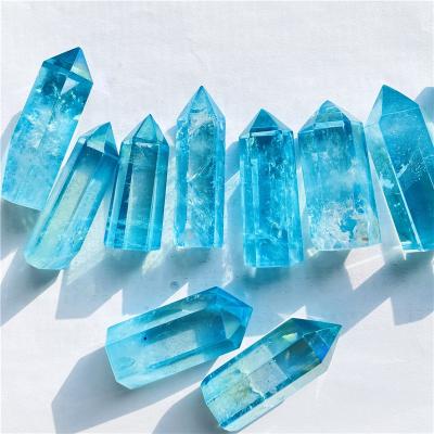 China Wholesale Natural Clad Stone China Quartz Point Healing Crystal Tower Crystal Angle Aura Blue Clear for sale